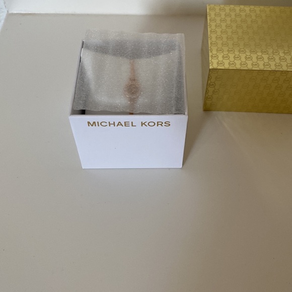 Michael Kors Polished Rose Gold-Tone MK Logo Bangle Bracelet - Picture 3 of 7